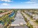 Scenic aerial view of waterfront houses along a canal, highlighting the neighborhood's desirable location at 4527 Barracuda Dr, Bradenton, FL 34208
