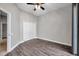 Neutral bedroom with vinyl floors and ceiling fan at 4527 Barracuda Dr, Bradenton, FL 34208