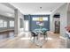 This dining room showcases a glass table set, complemented by bright lighting and an open layout at 4527 Barracuda Dr, Bradenton, FL 34208