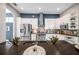 Open-concept kitchen with stainless appliances, stylish backsplash, and view of the sink and countertops at 4527 Barracuda Dr, Bradenton, FL 34208