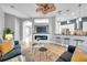 Spacious living room featuring stylish furniture, a modern fireplace, and an open-concept design at 4527 Barracuda Dr, Bradenton, FL 34208