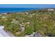 Enjoy the best of coastal living with this luxurious property and scenic views, nestled among beautiful landscaping at 480 58Th St, Sarasota, FL 34243