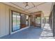 Covered screened patio offering outdoor living and yard views at 480 58Th St, Sarasota, FL 34243