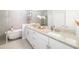Luxurious bathroom featuring a double sink vanity, soaking tub, and modern finishes at 5235 Coral Reef Way, Bradenton, FL 34211
