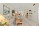 Bright living room boasts an open floor plan with neutral colors and seamless transition into the dining area at 5729 Avista Dr, Sarasota, FL 34243