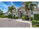 Community clubhouse with a stone facade and well-maintained landscaping, offering residents a central gathering place at 5833 Millennium Silver Ct, Sarasota, FL 34238