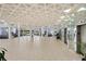 Spacious lobby features high ceilings, a geometric design, and ample seating space for residents and guests at 5855 Midnight Pass Rd # 204, Sarasota, FL 34242