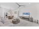 Open-concept living area flowing into the dining and kitchen spaces, perfect for modern living at 6260 Fish Eagle Ct, Nokomis, FL 34275