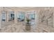 Elegant lobby with marble floors and designer lighting fixtures at 6260 Fish Eagle Ct, Nokomis, FL 34275