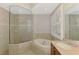 Bathroom with soaking tub, tiled surround and a frameless glass shower at 6310 Golden Eye Gln, Lakewood Ranch, FL 34202