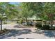 Community park featuring a covered picnic area, playground, and accessible parking at 6310 Golden Eye Gln, Lakewood Ranch, FL 34202
