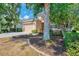 Attractive home with stone accents, a two-car garage, and mature landscaping at 6310 Golden Eye Gln, Lakewood Ranch, FL 34202
