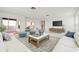 Bright and open living room features views into the dining area and lots of seating space at 6813 7Th W Ave, Bradenton, FL 34209