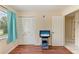 Bedroom featuring hardwood floors, a window, and a closet at 7002 Primm Pl, North Port, FL 34287