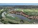 Panoramic aerial view of a lakeside golf community with lush landscaping at 7309 Regina Royale Blvd # 21, Sarasota, FL 34238