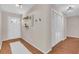 Inviting foyer with hardwood floors, closet, and stylish decor at 807 Harbor Ave, Ellenton, FL 34222