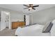 Well-lit bedroom with view to closet and en-suite bathroom at 807 Harbor Ave, Ellenton, FL 34222
