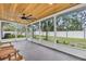 Spacious screened porch with view of backyard, offering an excellent space for relaxation and entertainment at 807 Harbor Ave, Ellenton, FL 34222