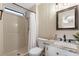 Bathroom featuring a stand-up shower, updated vanity with granite countertops, and a toilet at 8517 Buckingham Pl, Palmetto, FL 34221