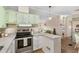 Stylish kitchen featuring granite countertops, stainless steel appliances, and plenty of counter space at 8517 Buckingham Pl, Palmetto, FL 34221
