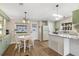 Bright eat in kitchen featuring plenty of natural light, a granite countertop, and stainless steel appliances at 8517 Buckingham Pl, Palmetto, FL 34221
