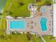Aerial view of a community pool and spa area offering a relaxing and social outdoor space at 8517 Buckingham Pl, Palmetto, FL 34221
