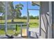 Relax on the screened porch with a beautiful view of the green backyard at 8615 59Th E St, Parrish, FL 34219