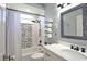 Modern bathroom featuring a stylish mosaic wall, sleek fixtures, and a contemporary vanity with ample storage at 8615 59Th E St, Parrish, FL 34219