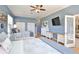 Spacious bedroom featuring two beds, creating a relaxing atmosphere with a view of the living area at 8615 59Th E St, Parrish, FL 34219