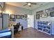 Bright home office featuring built-in desk, shelves, and natural light for a productive work environment at 8615 59Th E St, Parrish, FL 34219