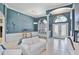 Open-concept living area with tile floors, a fireplace, and lots of natural light at 8615 59Th E St, Parrish, FL 34219