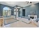 Bright and airy living room featuring tile floors, neutral decor, and large windows at 8615 59Th E St, Parrish, FL 34219
