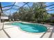 Inviting screened pool provides a refreshing escape with comfortable seating for relaxation at 9818 Portside Ter, Bradenton, FL 34212