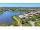 A stunning aerial view shows the home with water view in a beautiful community at 16436 Daysailor Trl, Lakewood Ranch, FL 34202
