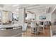 Stylish restaurant area featuring modern bar seating, elegant decor, and bright lighting at 16436 Daysailor Trl, Lakewood Ranch, FL 34202