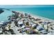 An aerial view showing a charming beach house located steps away from the ocean and intercoastal waterway at 1107 Shore View Dr, Englewood, FL 34223