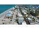 This aerial view shows a charming beach house surrounded by a coastal community at 1107 Shore View Dr, Englewood, FL 34223