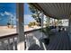 Charming porch with calming beach views, perfect for relaxation and enjoying the coastal breeze at 1107 Shore View Dr, Englewood, FL 34223