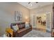 Another view of the Office with a sofa and access to the kitchen at 11723 Cullen Park Ter, Bradenton, FL 34211
