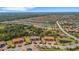 Scenic aerial view of a condo community featuring lush green spaces, serene lakes, and well-maintained landscaping at 12405 Osorio Ct # 202, Sarasota, FL 34238