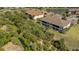 Scenic aerial view of the condos, showcasing the lush surroundings with palm trees and waterway at 12405 Osorio Ct # 202, Sarasota, FL 34238