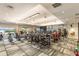 Well-equipped fitness center with treadmills, weights, and ample workout space at 12405 Osorio Ct # 202, Sarasota, FL 34238