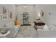 A relaxing living room boasts lots of comfortable seating and warm decorative touches at 12405 Osorio Ct # 202, Sarasota, FL 34238