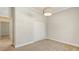 Bedroom featuring carpeting, neutral walls and trim and natural lighting at 14404 Stirling Dr, Lakewood Ranch, FL 34202