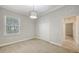 Carpeted bedroom offers a window and a bi-fold door at 14404 Stirling Dr, Lakewood Ranch, FL 34202