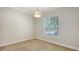 Carpeted bedroom with bright natural light and neutral walls and trim at 14404 Stirling Dr, Lakewood Ranch, FL 34202