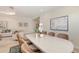 Elegant dining room with a large table, stylish chairs, and neutral color palette at 14404 Stirling Dr, Lakewood Ranch, FL 34202