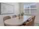 Bright dining area with seating for six and large windows providing natural light and a view of outdoors at 14404 Stirling Dr, Lakewood Ranch, FL 34202