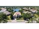A charming one-story home with neat landscaping, a paver driveway and a two-car garage at 14404 Stirling Dr, Lakewood Ranch, FL 34202
