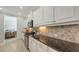 Spacious kitchen with granite counters and stainless appliances at 14404 Stirling Dr, Lakewood Ranch, FL 34202